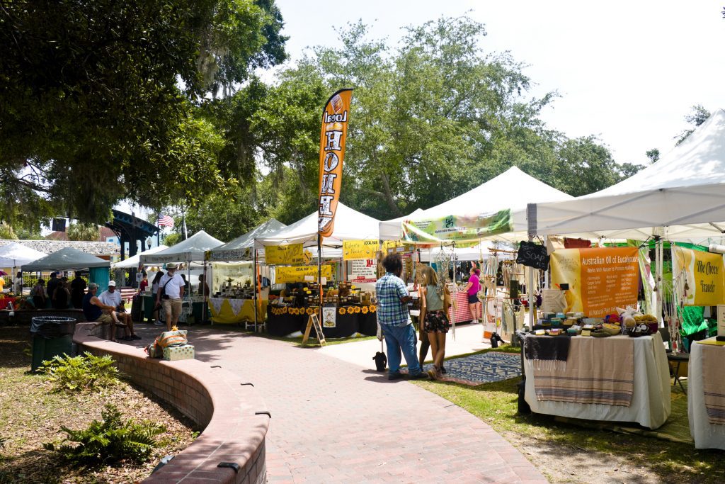 Downtown Market with many stalls in John R. Lawrence Pioneer Park in Dunedin, Florida, USA.