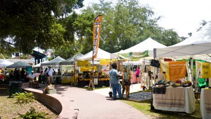 Downtown Market with many stalls in John R. Lawrence Pioneer Park in Dunedin, Florida, USA.